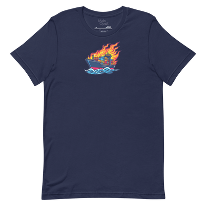 A navy blue t-shirt with a large graphic printed on the chest depicting a cargo boat full of shipping containers sailing while a massive flame engulfs the ship above deck